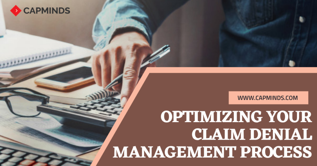 A man is tallying the bills for optimizing the claim denial management process