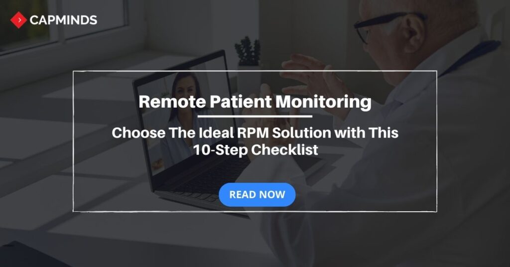 Patient and a doctor seen interacting to each other using laptop which meant to showcase the remote patient monitoring solution